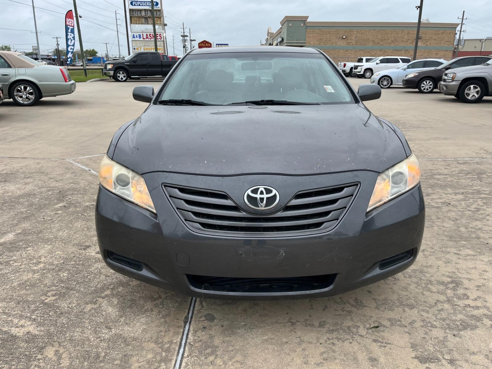 2007 GRAY /gray Toyota Camry CE 5-Spd AT (4T1BE46K37U) with an 2.4L L4 DOHC 16V engine, 5-Speed Automatic Overdrive transmission, located at 14700 Tomball Parkway 249, Houston, TX, 77086, (281) 444-2200, 29.928619, -95.504074 - Photo #1